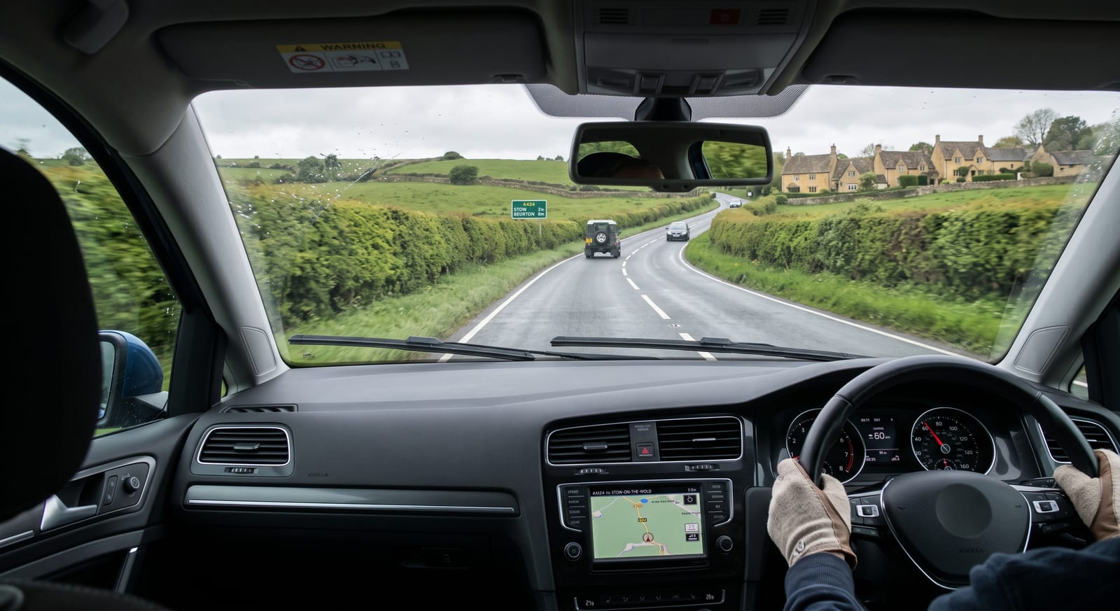 View through the windscreen of a right-hand-drive car on a British A-road